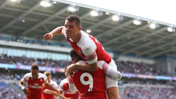 CARDIFF, WALES - SEPTEMBER 02: Granit Xhaka of Arsenal celebrates after Pierre-Emerick Aubameyang of Arsenal scores his sides second goal during the Premier League match between Cardiff City and Arsenal FC at Cardiff City Stadium on September 2, 2018 in Cardiff, United Kingdom. (Photo by Catherine Ivill/Getty Images)