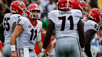 Jake Fromm, Andrew Thomas, Georgia Bulldogs. (Photo by Jamie Gilliam/Icon Sportswire via Getty Images)