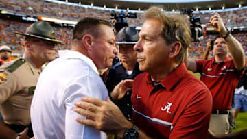 KNOXVILLE, TN - OCTOBER 15: Head coach Nick Saban of the Alabama Crimson Tide shakes hands with head coach Butch Jones of the Tennessee Volunteers after their 49-10 win at Neyland Stadium on October 15, 2016 in Knoxville, Tennessee. (Photo by Kevin C. Cox/Getty Images)