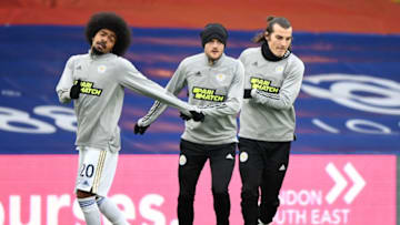 Leicester City's Hamza Choudhury (L), Jamie Vardy (C) and Caglar Soyuncu (R) (Photo by FACUNDO ARRIZABALAGA/POOL/AFP via Getty Images)