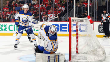 NEWARK, NEW JERSEY - APRIL 11: Devon Levi #27 of the Buffalo Sabres makes the second period save against the New Jersey Devils at the Prudential Center on April 11, 2023 in Newark, New Jersey. (Photo by Bruce Bennett/Getty Images)