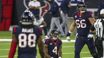 Jan 3, 2021; Houston, Texas, USA; Houston Texans quarterback Deshaun Watson (4) looks up after a play during the fourth quarter against the Tennessee Titans at NRG Stadium. Mandatory Credit: Troy Taormina-USA TODAY Sports