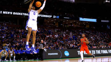 GREENVILLE, SC - MARCH 18: Wendell Moore Jr. #0 of the Duke Blue Devils dunks the ball against the CSU Fullerton Titans during the second half in the first round game of the 2022 NCAA Men's Basketball Tournament at Bon Secours Wellness Arena on March 18, 2022 in Greenville, South Carolina. (Photo by Lance King/Getty Images)