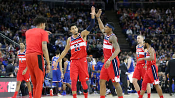 LONDON, ENGLAND - JANUARY 17: Otto Porter Jr. #22 and Bradley Beal #3 of the Washington Wizards high five during the 2019 NBA London Game against the New York Knicks on January 17, 2019 at The O2 Arena in London, England. NOTE TO USER: User expressly acknowledges and agrees that, by downloading and/or using this photograph, user is consenting to the terms and conditions of the Getty Images License Agreement. Mandatory Copyright Notice: Copyright 2019 NBAE (Photo by Ned Dishman/NBAE via Getty Images)