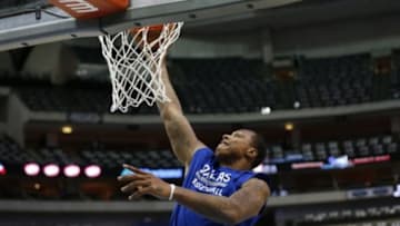 Nov 13, 2014; Dallas, TX, USA; Dallas Mavericks center Greg Smith shoots prior to the game against the Philadelphia 76ers at American Airlines Center. Mandatory Credit: Matthew Emmons-USA TODAY Sports