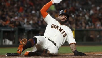 SAN FRANCISCO, CA - SEPTEMBER 09: Kevin Pillar #1 of the San Francisco Giants slides to score at home plate during the sixth inning against the Pittsburgh Pirates at Oracle Park on September 9, 2019 in San Francisco, California. (Photo by Stephen Lam/Getty Images)