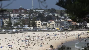 SYDNEY, AUSTRALIA - JANUARY 14: A general view of a busy Bondi Beach on January 14, 2021 in Sydney, Australia. New South Wales recorded no new locally acquired cases of COVID-19 in the last 24 hour reporting period. The last time there were no locally acquired cases in NSW was on 6 January 2021. (Photo by Brook Mitchell/Getty Images)
