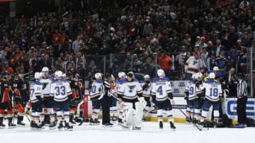 ANAHEIM, CA - FEBRUARY 11: The St. Louis Blues and the Anaheim Ducks watch as the paramedics tend to Jay Bouwmeester #19 of the St. Louis Blues after he collapsed on the bench during the first period of the game at Honda Center on February 11, 2020 in Anaheim, California. (Photo by Debora Robinson/NHLI via Getty Images)