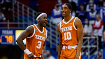 Jan 2, 2021; Lawrence, Kansas, USA; Texas Longhorns guard Courtney Ramey (3) talks to guard Donovan Williams (10) during the second half against the Kansas Jayhawks at Allen Fieldhouse. Mandatory Credit: Jay Biggerstaff-USA TODAY Sports