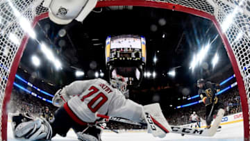 LAS VEGAS, NV - MAY 30: Braden Holtby #70 of the Washington Capitals makes a diving stick-save on Alex Tuch #89 of the Vegas Golden Knights during the third period in Game Two of the 2018 NHL Stanley Cup Final at T-Mobile Arena on May 30, 2018 in Las Vegas, Nevada. The Capitals defeated the Golden Knights3-2. (Photo by Jeff Bottari/NHLI via Getty Images)
