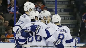 Jan 8, 2016; Edmonton, Alberta, CAN; The Tampa Bay Lightning celebrate a third period goal by forward Nikita Kucherov (86) against the Edmonton Oilers at Rexall Place. Mandatory Credit: Perry Nelson-USA TODAY Sports