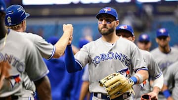 ST PETERSBURG, FL - MAY 6: Kevin Pillar #11 of the Toronto Blue Jays celebrates with teammates after winning 2-1 against the Tampa Bay Rays on May 6, 2018 at Tropicana Field in St Petersburg, Florida. (Photo by Julio Aguilar/Getty Images)