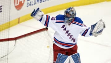 Mar 3, 2016; Pittsburgh, PA, USA; New York Rangers goalie Henrik Lundqvist (30) reacts upon receiving a two minute penalty for delay of game after knocking the net from it