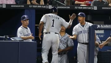 Jul 26, 2014; Atlanta, GA, USA; San Diego Padres second baseman Chris Nelson (1) is congratulated by manager Bud Black (20) and bench coach Dave Roberts (10) after scoring a run against the Atlanta Braves in the fifth inning at Turner Field. Mandatory Credit: Brett Davis-USA TODAY Sports