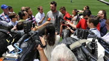 Jun 7, 2016; Englewood, CO, USA; Denver Broncos quarterback Paxton Lynch (12) talks to the media following mini camp drills at the UCHealth Training Center. Mandatory Credit: Ron Chenoy-USA TODAY Sports