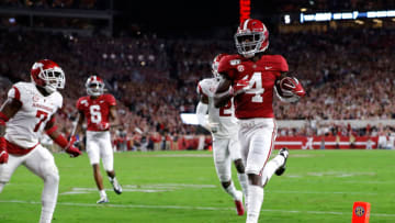 TUSCALOOSA, ALABAMA - OCTOBER 26: Jerry Jeudy #4 of the Alabama Crimson Tide carries this reception in for a touchdown in the first half against the Arkansas Razorbacks at Bryant-Denny Stadium on October 26, 2019 in Tuscaloosa, Alabama. (Photo by Kevin C. Cox/Getty Images)