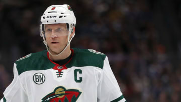 DENVER, COLORADO - JANUARY 23: Mikko Koivu #9 of the Minnesota Wild plays the Colorado Avalanche at the Pepsi Center on January 23, 2019 in Denver, Colorado. (Photo by Matthew Stockman/Getty Images)
