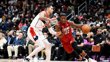 WASHINGTON, DC - FEBRUARY 07: Jimmy Butler #22 of the Miami Heat handles the ball against Kyle Kuzma #33 of the Washington Wizards at Capital One Arena on February 07, 2022 in Washington, DC. NOTE TO USER: User expressly acknowledges and agrees that, by downloading and or using this photograph, User is consenting to the terms and conditions of the Getty Images License Agreement. (Photo by G Fiume/Getty Images)