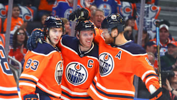 EDMONTON, AB - MARCH 27: Edmonton Oilers Center Connor McDavid (97) celebrates his 100th point on a goal by Edmonton Oilers Left Wing Ryan Nugent-Hopkins (93) in the first period during the Edmonton Oilers game versus the Columbus Blue Jackets game on March 27, 2018, at Rogers Place in Edmonton, AB. (Photo by Curtis Comeau/Icon Sportswire via Getty Images)