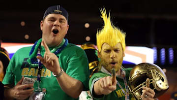 MIAMI GARDENS, FL - JANUARY 07: Fans of the Notre Dame Fighting Irish cheer prior to the 2013 Discover BCS National Championship game at Sun Life Stadium on January 7, 2013 in Miami Gardens, Florida. (Photo by Streeter Lecka/Getty Images)