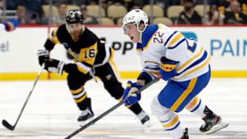 Oct 7, 2022; Pittsburgh, Pennsylvania, USA; Buffalo Sabres right wing Jack Quinn (22) skates up ice with the puck against the Pittsburgh Penguins during the third period at PPG Paints Arena. The Penguins won 7-1. Mandatory Credit: Charles LeClaire-USA TODAY Sports