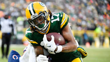 GREEN BAY, WISCONSIN - DECEMBER 15: Davante Adams #17 of the Green Bay Packers gets a first down in the second half against Eddie Jackson #39 of the Chicago Bears at Lambeau Field on December 15, 2019 in Green Bay, Wisconsin. (Photo by Quinn Harris/Getty Images)