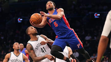 Feb 1, 2016; Brooklyn, NY, USA; Detroit Pistons small forward Darrun Hilliard (6) shoots the ball past Brooklyn Nets power forward Thomas Robinson (41) during the second quarter at Barclays Center. Mandatory Credit: Brad Penner-USA TODAY Sports