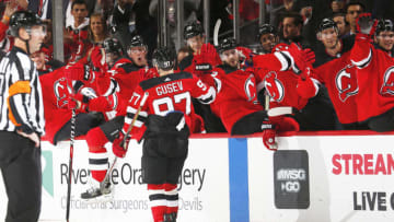 NEWARK, NJ- October 04: Nikita Gusev #97 of the New Jersey Devils celebrates his first NHL goal with teammates during his first NHL game against the Winnipeg Jets on October 4, 2019 at Prudential Center in Newark, New Jersey. (Photo by Andy Marlin/NHLI via Getty Images)