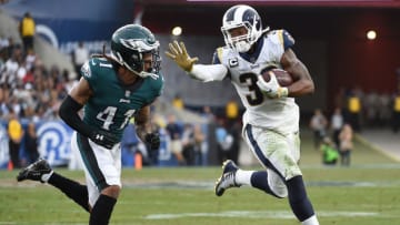 LOS ANGELES, CA - DECEMBER 10: Running back Todd Gurley #30 of the Los Angeles Rams rushes for a gain against cornerback Ronald Darby #41 of the Philadelphia Eagles during the second half at Los Angeles Memorial Coliseum on December 10, 2017 in Los Angeles, California. (Photo by Kevork Djansezian/Getty Images)