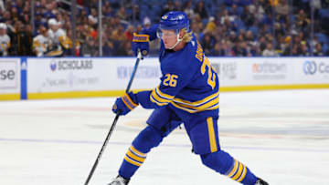 Oct 6, 2023; Buffalo, New York, USA; Buffalo Sabres defenseman Rasmus Dahlin (26) takes a shot on goal during the second period against the Pittsburgh Penguins at KeyBank Center. Mandatory Credit: Timothy T. Ludwig-USA TODAY Sports
