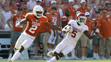 DALLAS, TX - OCTOBER 14: Kris Boyd #2 of the Texas Longhorns pursues Marquise Brown #5 of the Oklahoma Sooners in the second half of a football game at the Cotton Bowl on October 14, 2017 in Dallas, Texas. (Photo by Richard W. Rodriguez/Getty Images)
