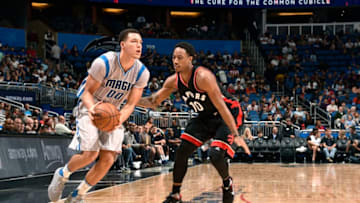 ORLANDO, FL - DECEMBER 18: Aaron Gordon #00 of the Orlando Magic handles the ball during the game against the Toronto Raptors on December 18, 2016 at Amway Center in Orlando, Florida. NOTE TO USER: User expressly acknowledges and agrees that, by downloading and or using this photograph, User is consenting to the terms and conditions of the Getty Images License Agreement. Mandatory Copyright Notice: Copyright 2016 NBAE (Photo by Gary Bassing/NBAE via Getty Images)