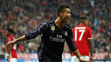 MUNICH, GERMANY - APRIL 12: Cristiano Ronaldo of Real Madrid celebrates after scoring his team's second goal during the UEFA Champions League Quarter Final first leg match between FC Bayern Muenchen and Real Madrid CF at Allianz Arena on April 12, 2017 in Munich, Germany. (Photo by Angel Martinez/Real Madrid via Getty Images)