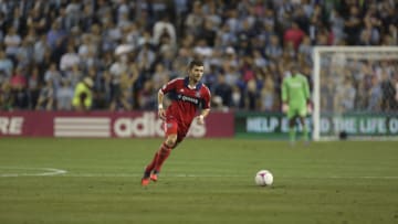 KANSAS CITY, KS - SEPTEMBER 28: Gonzalo Segares #13 of the Chicago Fire works the ball against the Sporting Kansas City in the first half at Livestrong Sporting Park on September 28, 2012 in Kansas City, Kansas. (Photo by Ed Zurga/Getty Images)
