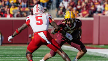 Oct 16, 2021; Minneapolis, Minnesota, USA; Minnesota Golden Gophers wide receiver Chris Autman-Bell (7) and Nebraska Cornhuskers linebacker Cam Taylor-Britt (5) at Huntington Bank Stadium. Mandatory Credit: Nick Wosika-USA TODAY Sports