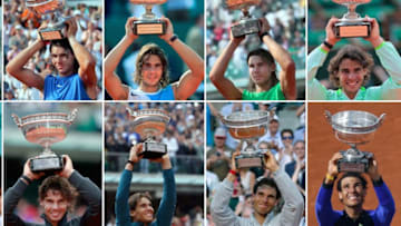 TOPSHOT - This combination of pictures created on June 9, 2019 shows Spain's Rafael Nadal posing with the Mousquetaires Cup (The Musketeers) during his twelve victories in the men's French Tennis Open at the Roland Garros stadium. Nadal poses with his trophies (From top L to bottom R) on June 5, 2005; on June 11, 2006; on June 10, 2007; on June 8, 2008; on June 6, 2010; on June 10, 2018; on June 5, 2011; on June 11, 2012; on June 9, 2013; on June 8, 2014 and on June 11, 2017 and June 9, 2019. - Rafael Nadal claimed a 12th French Open title on June 9, 2019 with a 6-3, 7-5, 6-1, 6-1 against Austria's Dominic Thiem. (Photo by - / AFP) (Photo credit should read -/AFP via Getty Images)