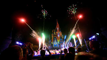 ORLANDO, FLORIDA - NOVEMBER 09: Guests react to the Holiday Wishes: Celebrate the Spirit of the Season fireworks during the 'Mickey's Very Merry Christmas Party' at Walt Disney World on November 09, 2018 in Orlando, Florida. (Photo by Gerardo Mora/Getty Images)