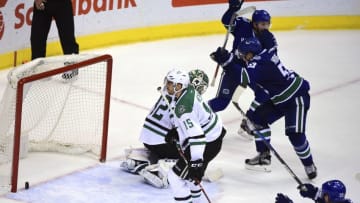 Nov 13, 2016; Vancouver, British Columbia, CAN; Vancouver Canucks defenseman Troy Stecher (51) scores against Dallas Stars goaltender Kari Lehtonen (32) during the third period at Rogers Arena. The Vancouver Canucks won 5-4 in overtime. Mandatory Credit: Anne-Marie Sorvin-USA TODAY Sports