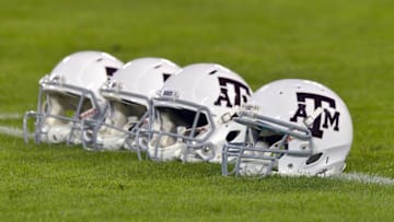 Dec 30, 2015; Nashville, TN, USA; Texas A&M Aggies helmets on the field prior to the 2015 Music City Bowl against the Louisville Cardinals at Nissan Stadium. Mandatory Credit: Jim Brown-USA TODAY Sports