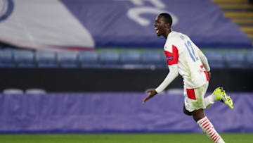 LEICESTER, ENGLAND - FEBRUARY 25: Abdallah Sima of Slavia Prague celebrates after scoring a goal to make it 0-2 during the UEFA Europa League Round of 32 match between Leicester City and Slavia Praha at The King Power Stadium on February 25, 2021 in Leicester, United Kingdom. Sporting stadiums around the UK remain under strict restrictions due to the Coronavirus Pandemic as Government social distancing laws prohibit fans inside venues resulting in games being played behind closed doors. (Photo by James Williamson - AMA/Getty Images)