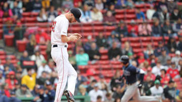 BOSTON - APRIL 28: Boston Red Sox starting pitcher Chris Sale reacts on the mound as the Rays' Daniel Robertson rounds third base after hitting a two-run home run during the first inning. The Boston Red Sox host the Tampa Bay Rays in a regular season MLB baseball game at Fenway Park in Boston on April 28, 2019. (Photo by Matthew J. Lee/The Boston Globe via Getty Images)