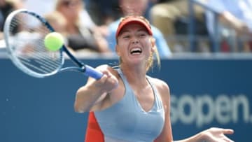 Aug 31, 2014; New York, NY, USA; Maria Sharapova (RUS) hits to Caroline Wozniacki (DEN) on day seven of the 2014 U.S. Open tennis tournament at USTA Billie Jean King National Tennis Center. Mandatory Credit: Robert Deutsch-USA TODAY Sports
