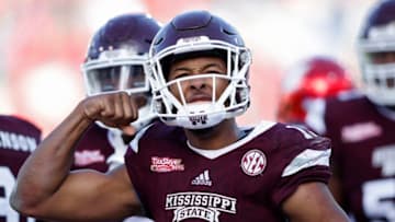 JACKSONVILLE, FL - DECEMBER 30: Keytaon Thompson #10 of the Mississippi State Bulldogs reacts after his third touchdown rush of the game to give his team the lead in the fourth quarter of the TaxSlayer Bowl against the Louisville Cardinals at EverBank Field on December 30, 2017 in Jacksonville, Florida. The Bulldogs won 31-27. (Photo by Joe Robbins/Getty Images)