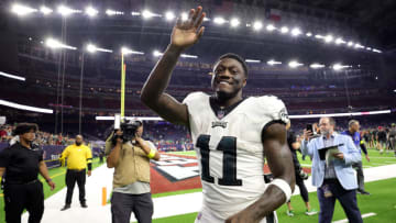 HOUSTON, TEXAS - NOVEMBER 03: A.J. Brown #11 of the Philadelphia Eagles celebrates a 29-17 win against the Houston Texans at NRG Stadium on November 03, 2022 in Houston, Texas. (Photo by Carmen Mandato/Getty Images)
