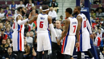 Dec 13, 2013; Auburn Hills, MI, USA; Detroit Pistons small forward Josh Smith (6) celebrates with teammates center Andre Drummond (0) point guard Brandon Jennings (7) and power forward Greg Monroe (10) during the second quarter against the Brooklyn Nets at The Palace of Auburn Hills. Pistons beat the Nets 103-99. Mandatory Credit: Raj Mehta-USA TODAY Sports