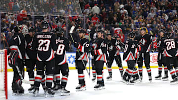 Feb 26, 2023; Buffalo, New York, USA; The Buffalo Sabres celebrate a win over the Washington Capitals at KeyBank Center. Mandatory Credit: Timothy T. Ludwig-USA TODAY Sports