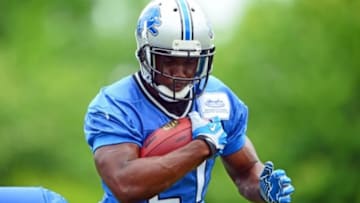 Jun 10, 2014; Detroit, MI, USA; Detroit Lions running back Reggie Bush (21) during mini camp at Detroit Lions training facility. Mandatory Credit: Andrew Weber-USA TODAY Sports