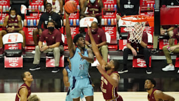 Nov 26, 2020; Uncasville, CT, USA; Rhode Island Rams center Makhi Mitchell (21) shoots against Boston College Eagles forward Frederick Scott (0) in the first half at Mohegan Sun. Mandatory Credit: David Butler II-USA TODAY Sports