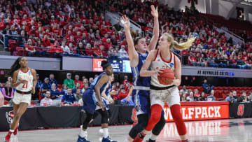 RALEIGH, NC - MARCH 23: NC State Wolfpack center Elissa Cunane (33) fights for position during the 2019 Div 1 Women's Championship - First Round college basketball game between the Maine Black Bears and NC State Wolfpack on March 23, 2019, at Reynolds Coliseum in Raleigh, NC. (Photo by Michael Berg/Icon Sportswire via Getty Images)
