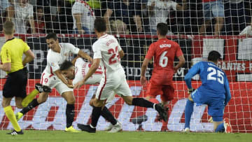 Sevilla's Portuguese forward Andre Silva (4R) celebrates after scoring a goal during the Spanish league football match Sevilla FC against Real Madrid CF at the Ramon Sanchez Pizjuan stadium in Seville on September 26, 2018. (Photo by CRISTINA QUICLER / AFP) (Photo credit should read CRISTINA QUICLER/AFP/Getty Images)